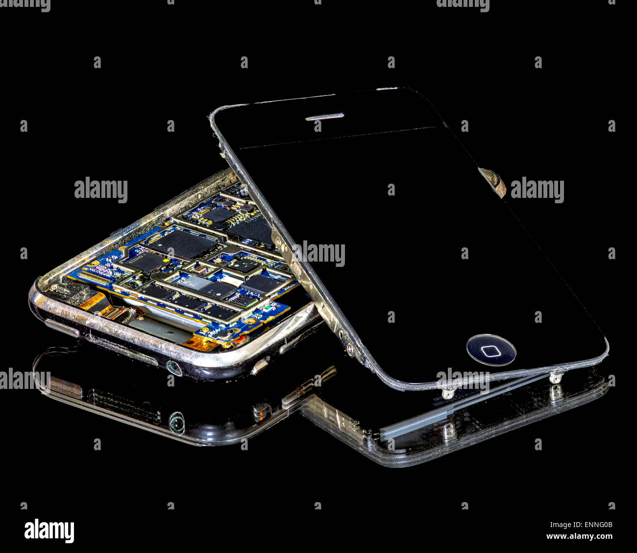 Smart phone opened up and exposing electronics Stock Photo
