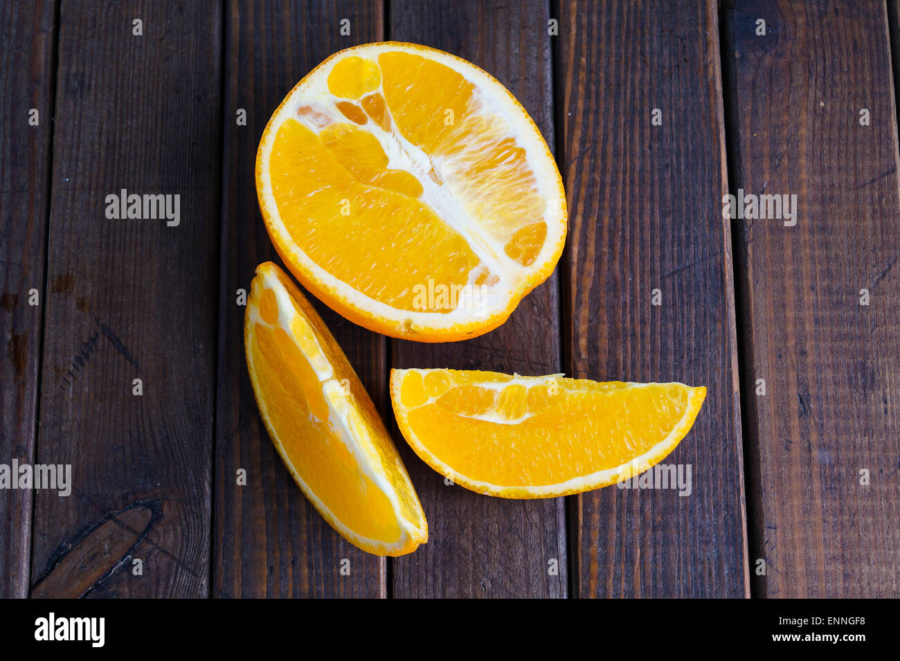 Fresh jucy orange in half and slices Stock Photo