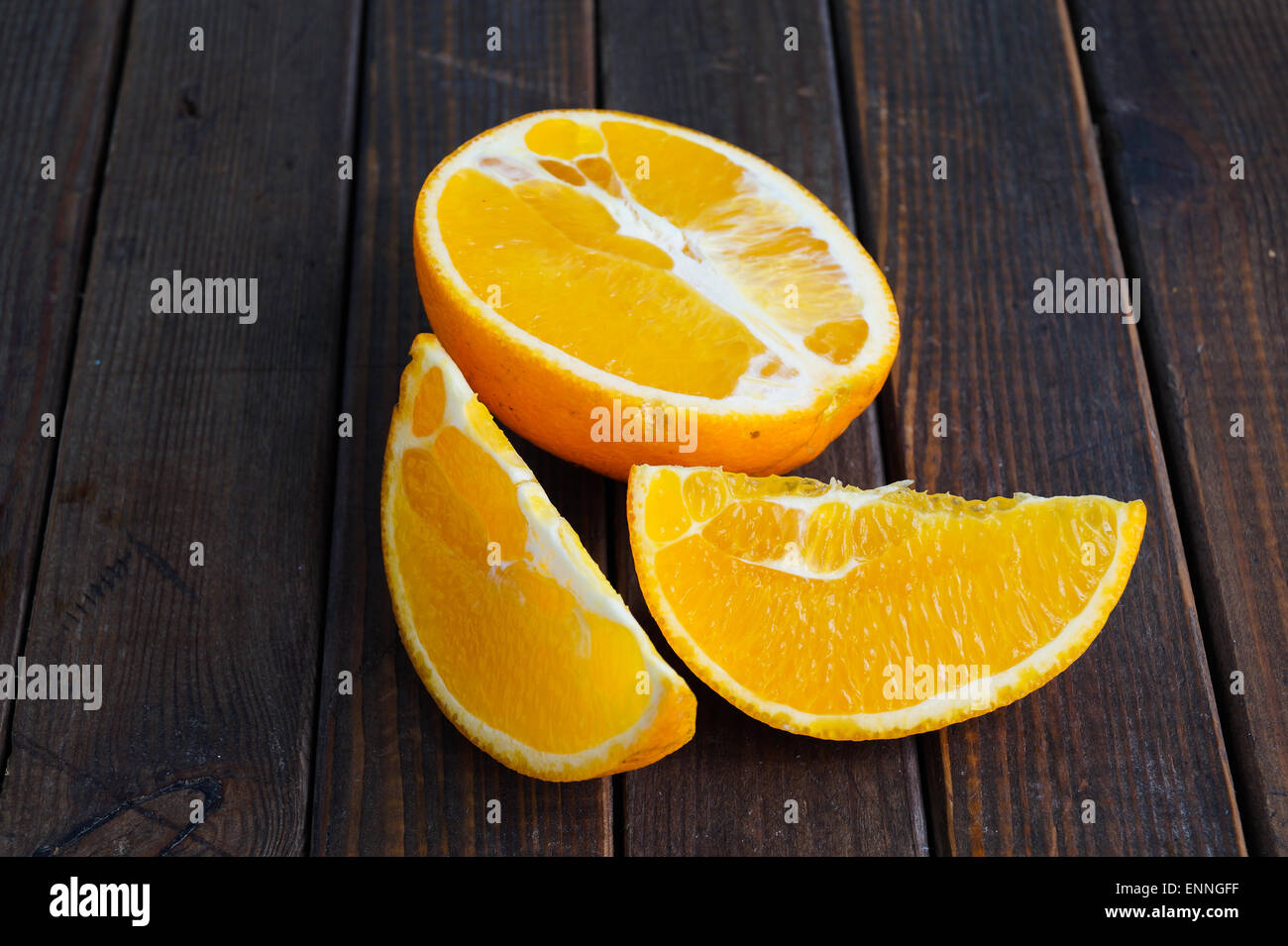 Fresh jucy orange in half and slices Stock Photo