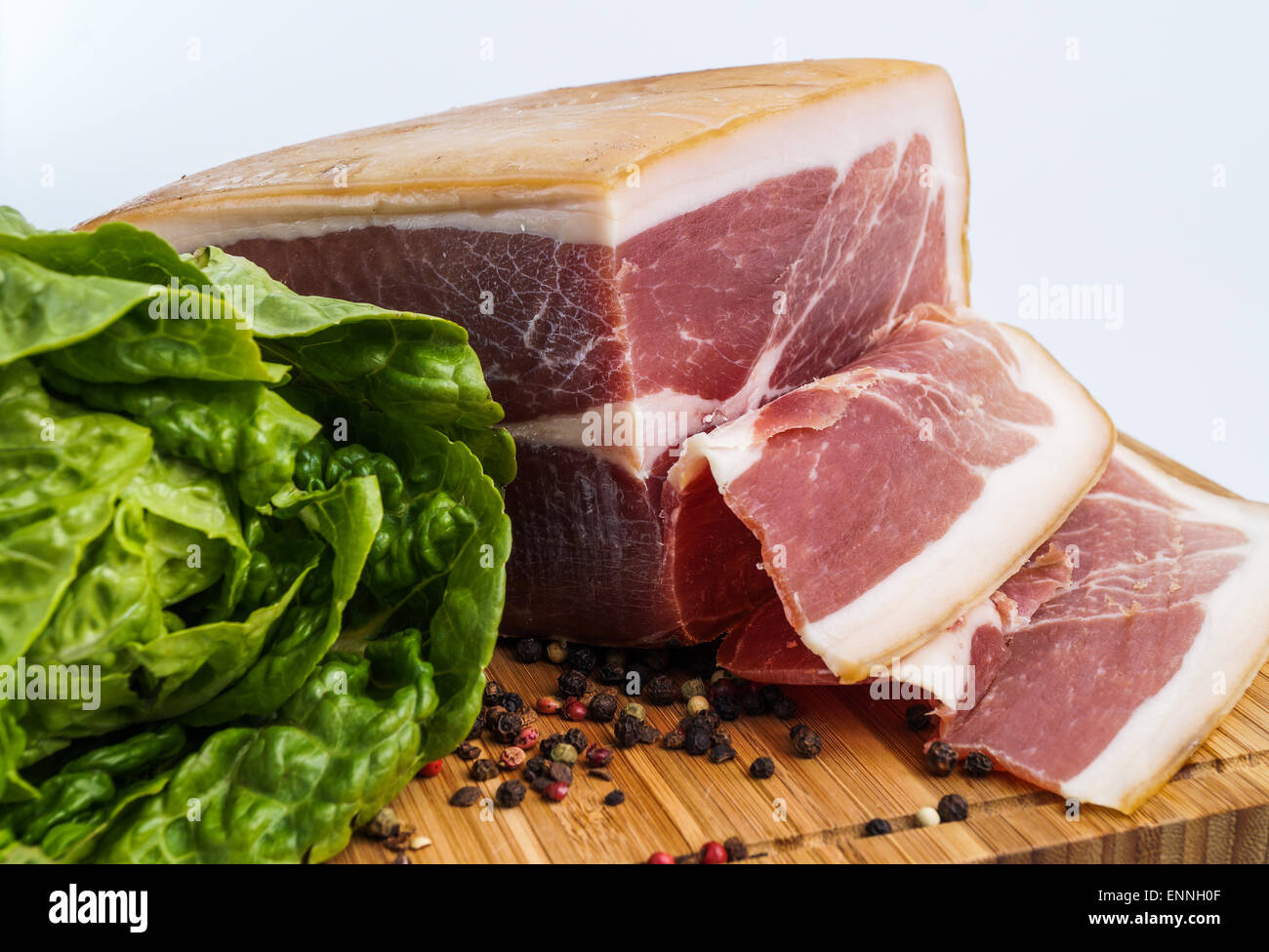 Whole prosciutto italian ham sliced for sandwich Stock Photo Alamy