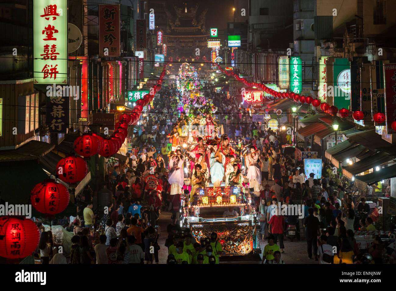 A parade of brightly lit floats parade in front of Chaotian Temple in Beigang, Taiwan Stock Photo