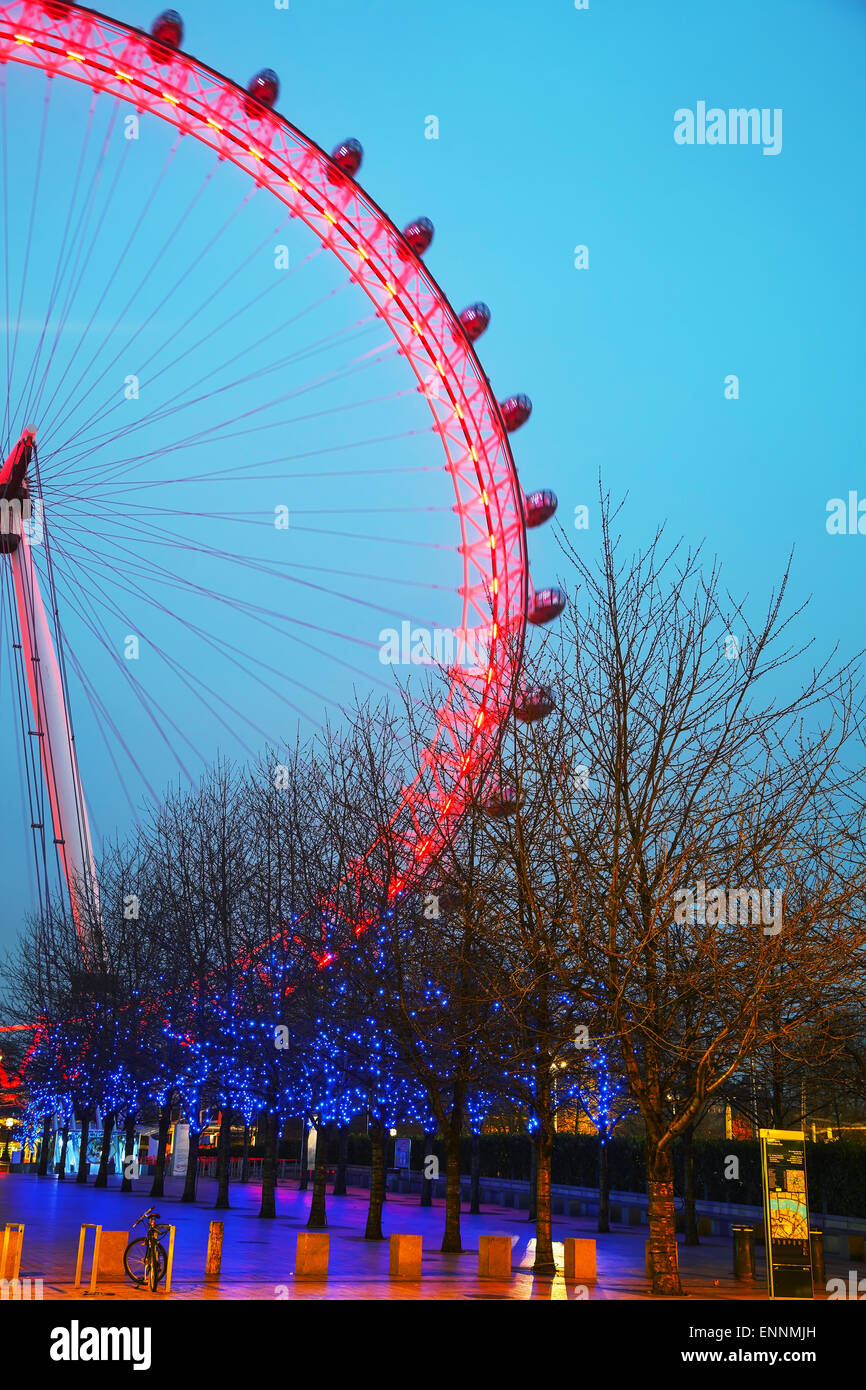 LONDON - APRIL5: The London Eye Ferris wheel in the evening on April 5, 2015 in London, UK. Stock Photo