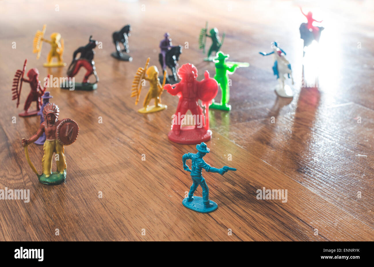 Miniature figures toys on the floor backlight Stock Photo