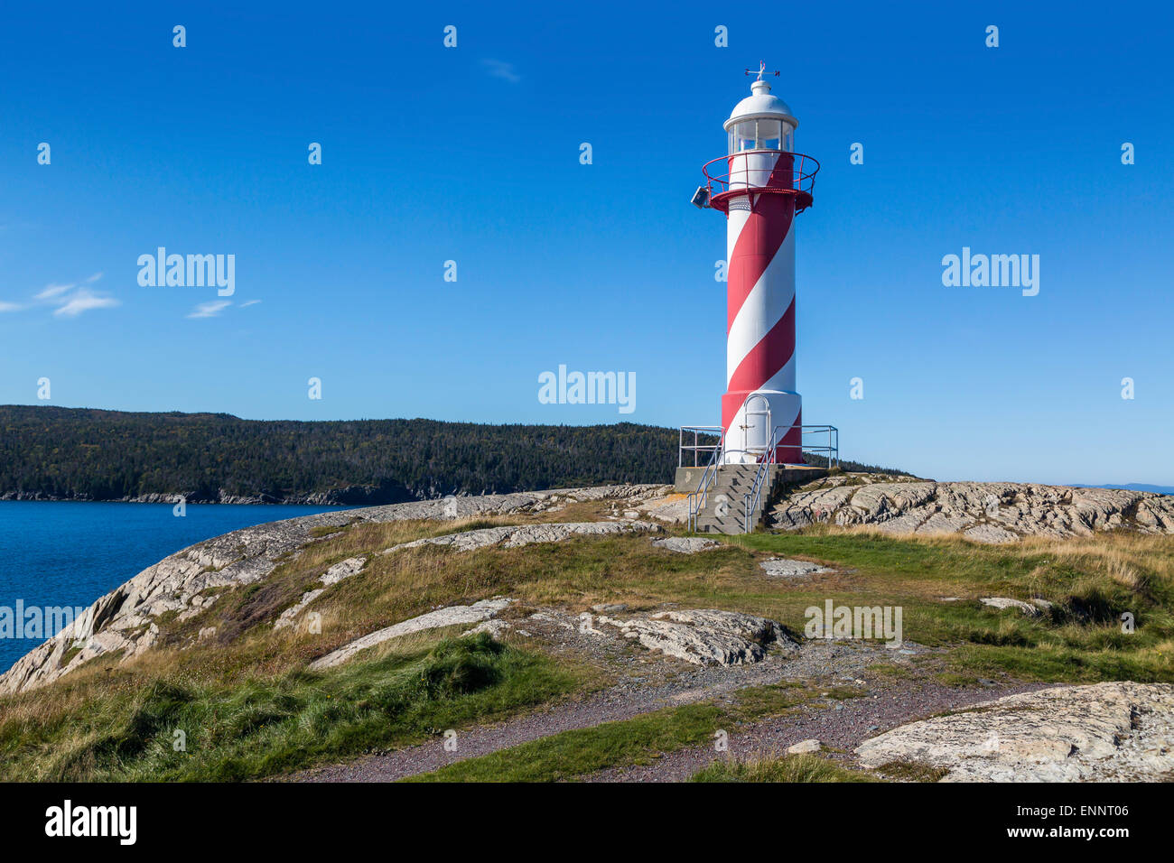 Candy cane colored lighthouse in Heart's Delight, Newfoundland, Canada. Stock Photo