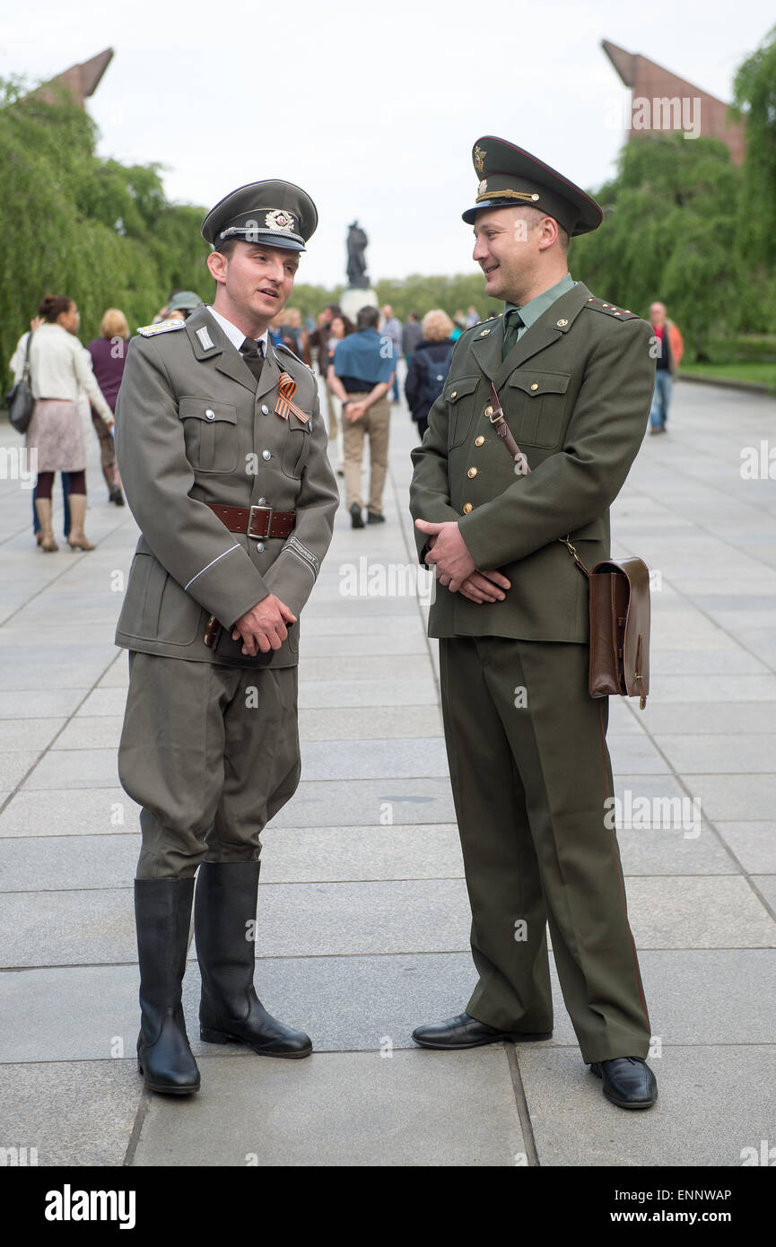 A visitor to the Soviet Memorial in Treptower Park wearing an NVA uniform  (l) and another wearing Soviet uniform, Berlin, 8 May 2015. The Second  World War ended 70 years ago on