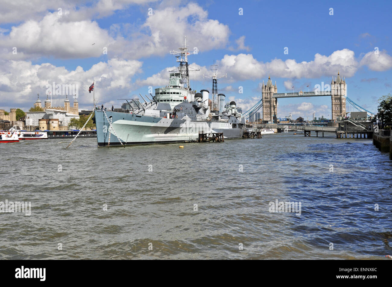 HMS Belfast Ship Museum and the Tower Bridge at the background, London, U.K. Stock Photo