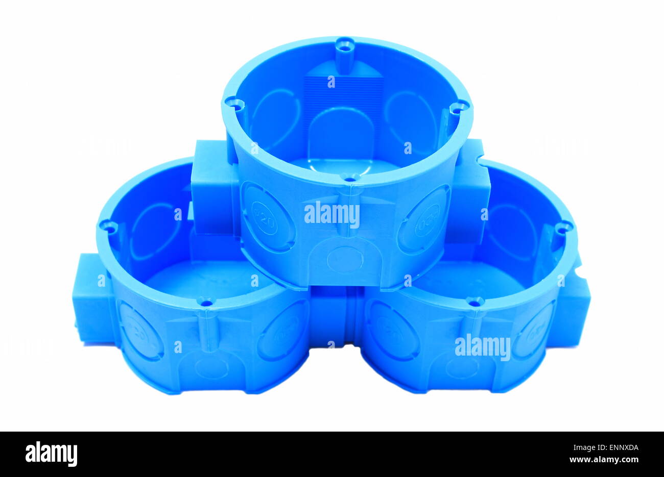 Stack of blue plastic electrical boxes on white background, junction