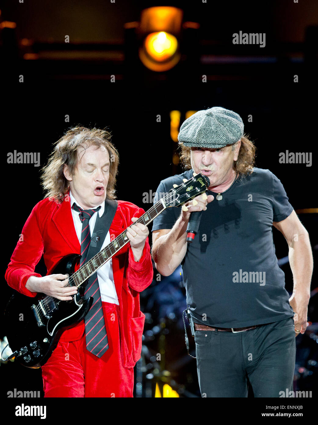Nuremberg, Germany. 8th May, 2015. Singer of the Australian rock band AC/DC, Brian Johnson (l), and guitarist Angus Young on stage at the start of their German tour in Nuremberg, Germany, 8 May 2015. Photo: Daniel Karmann/dpa/Alamy Live News Stock Photo