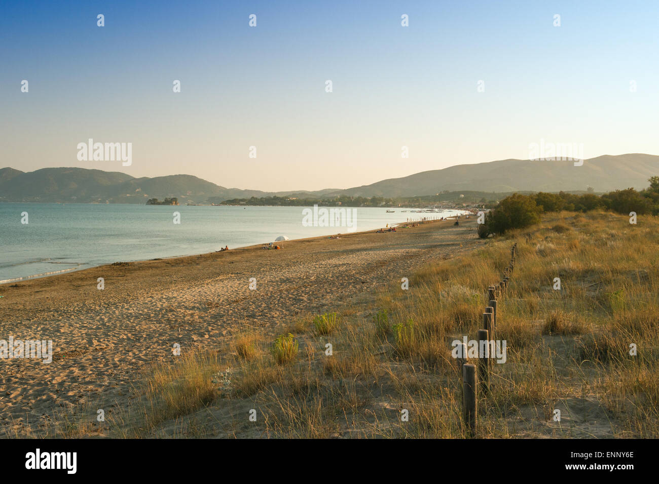 Sunny beach with sand dunes and blue sky  in Zakynthos island, Greece Stock Photo