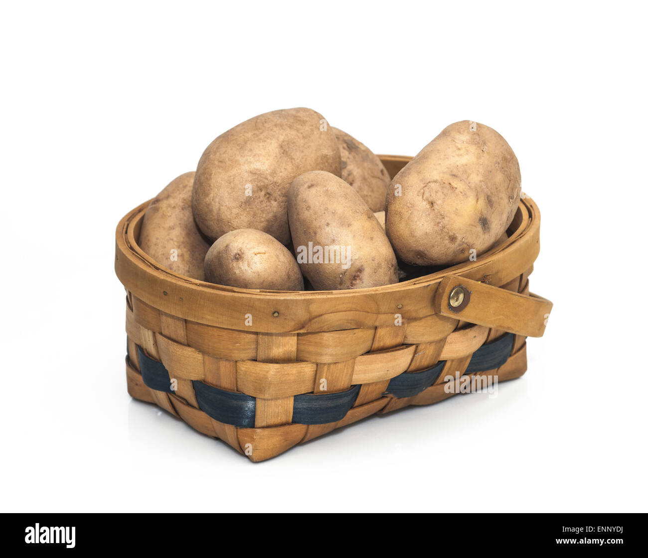 Potatoes in a Basket isolated on a white background. Stock Photo