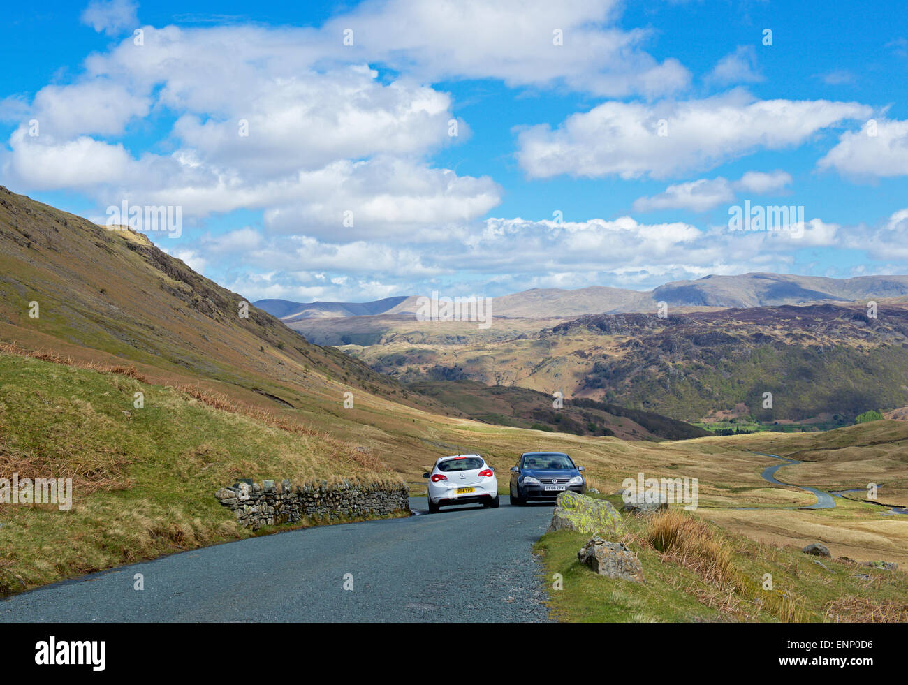 Two cars passing on the narrow Honister Pass (B5289), Lake District National Park, Cumbria, England UK Stock Photo