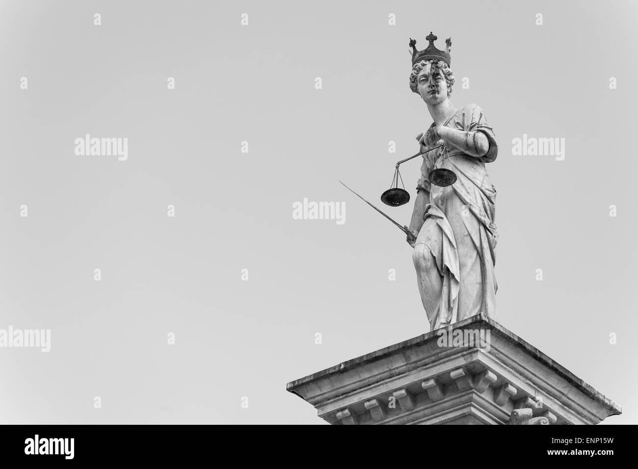 Statue of Justice, on the background of the sky Stock Photo
