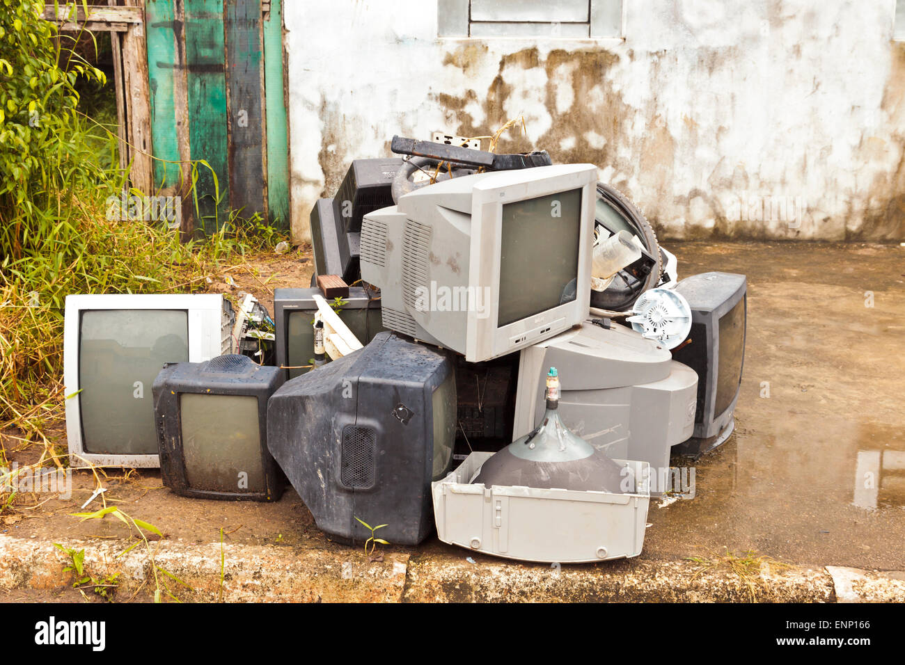 Maues Brazil recycling involves dumping old television on a street corner Stock Photo