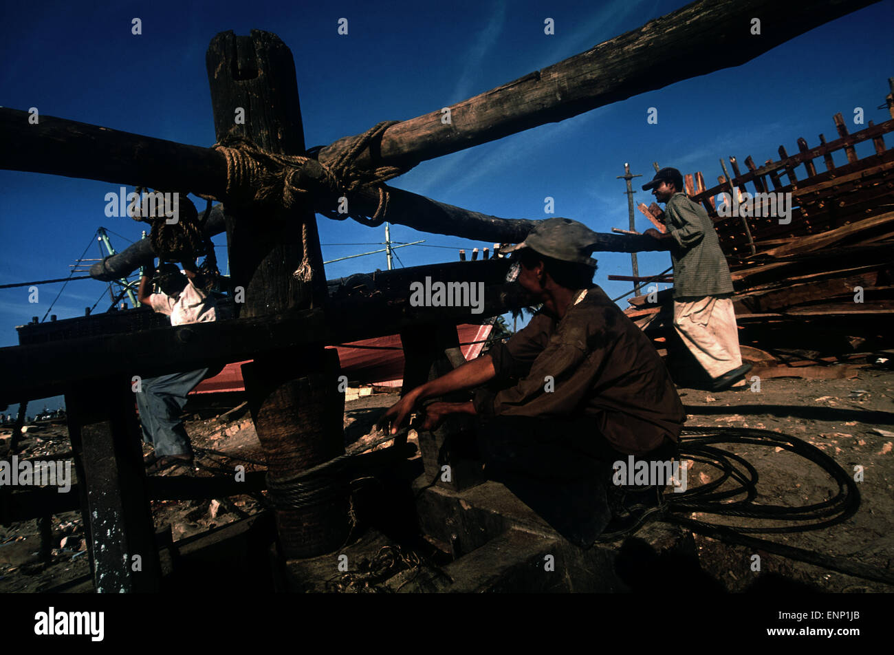 Workers in a shipyard in Diu island,India Stock Photo