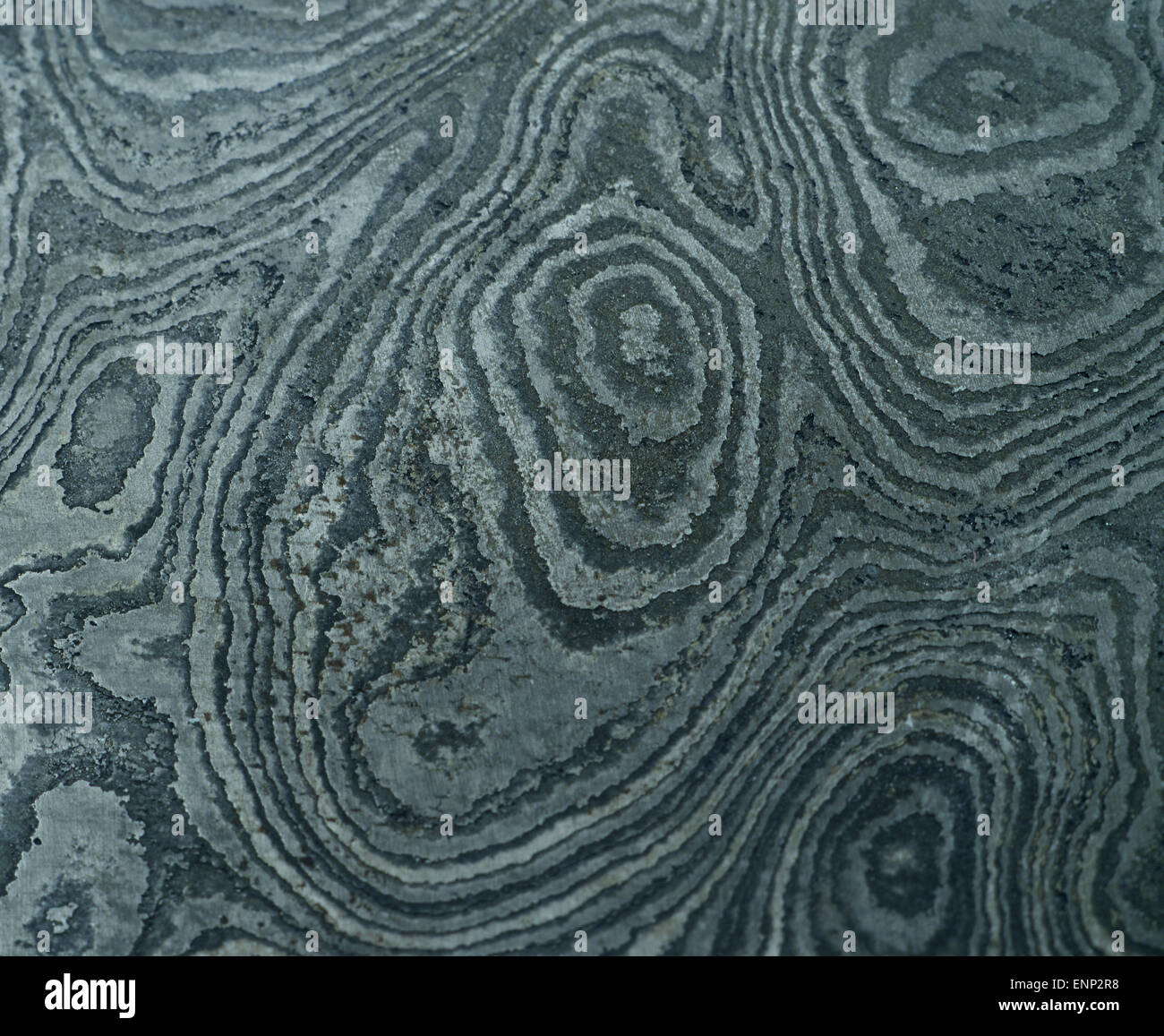 Damascus steel with original pattern - forged metal,traditionally used for creating cold arms on Middle East Stock Photo
