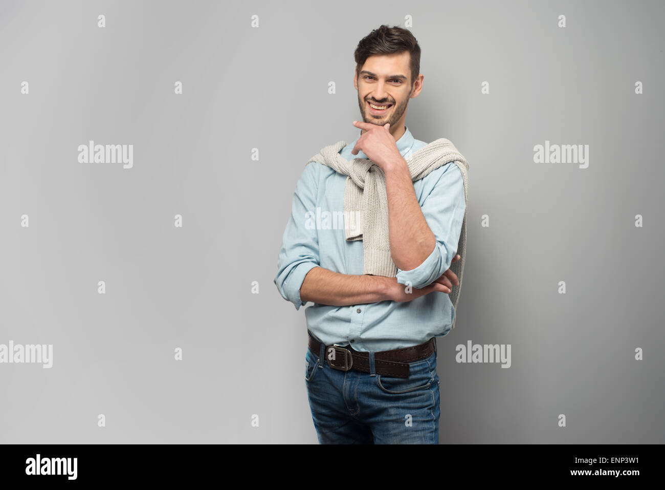 Smiling man looking at camera Stock Photo - Alamy