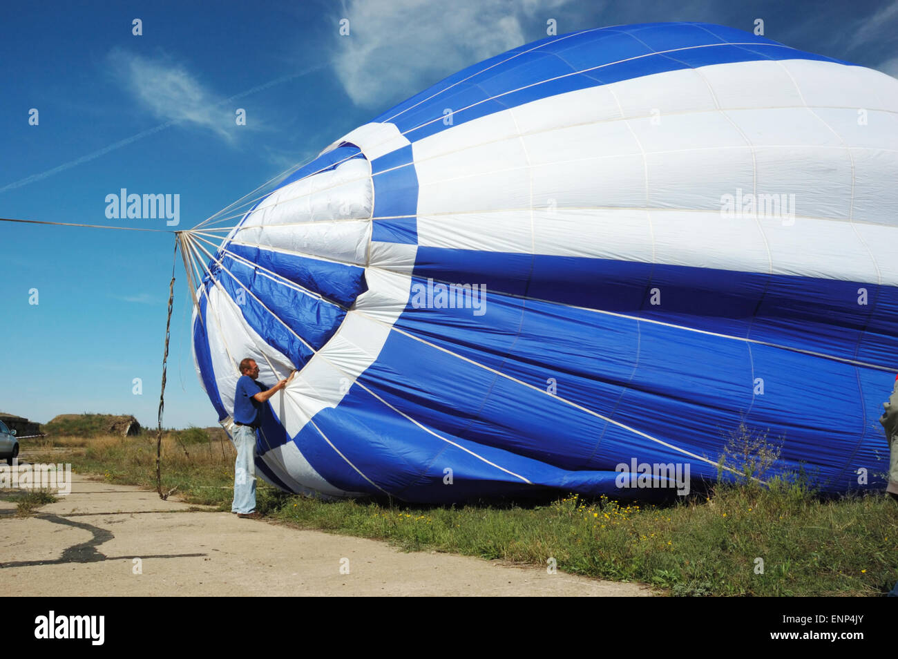 ODESSA, UKRAINE - SEPTEMBER 11,2010 Pilot is preparing for the launch balloon in the air,First Odessa's Balloon Festival ,Septem Stock Photo