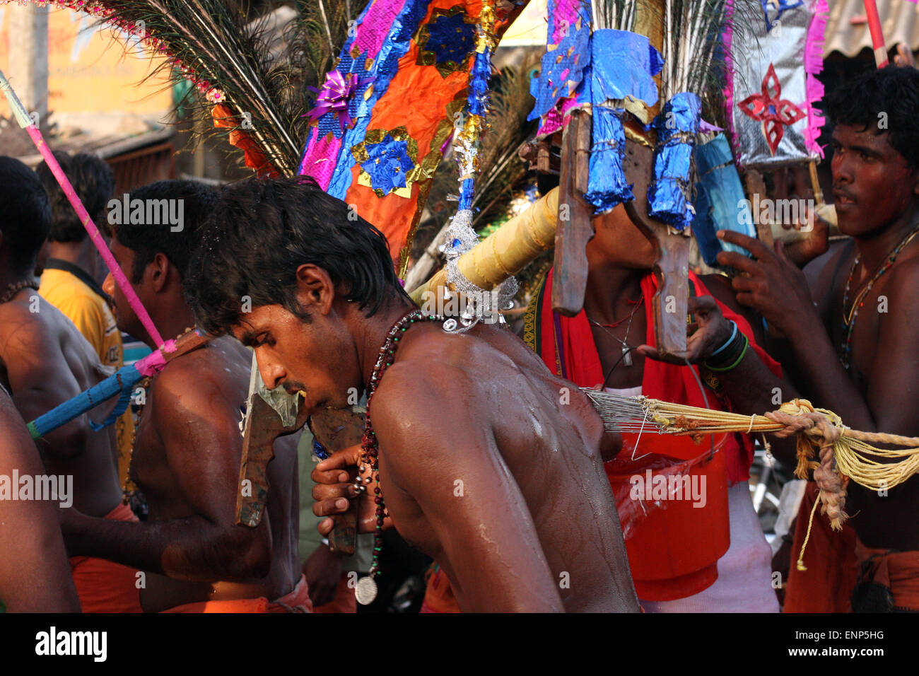 Tamil Hindu procession including man with hooks in his back to enact his religious devotion, near Trincomalee, Sri Lanka Stock Photo