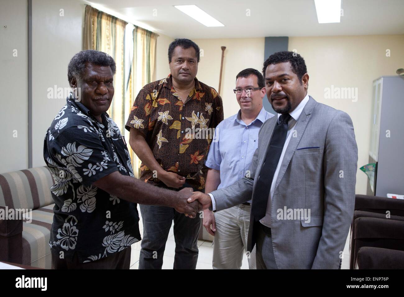 Vanuatu, Port Vila, the capital, 2 months after PAM cyclone, aftermath, (left) Vanuatu Minister of Climate Change James Bule, signes the declaration of Lifou, Louis Win-Nemo, Nicolas Imbert, Director of Green Cross France,    Anthony Lecren Minister of Environment of New Caledonia Stock Photo