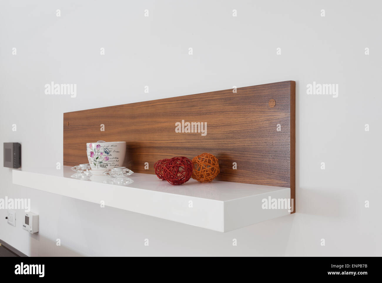 wooden shelf on the white wall Stock Photo - Alamy