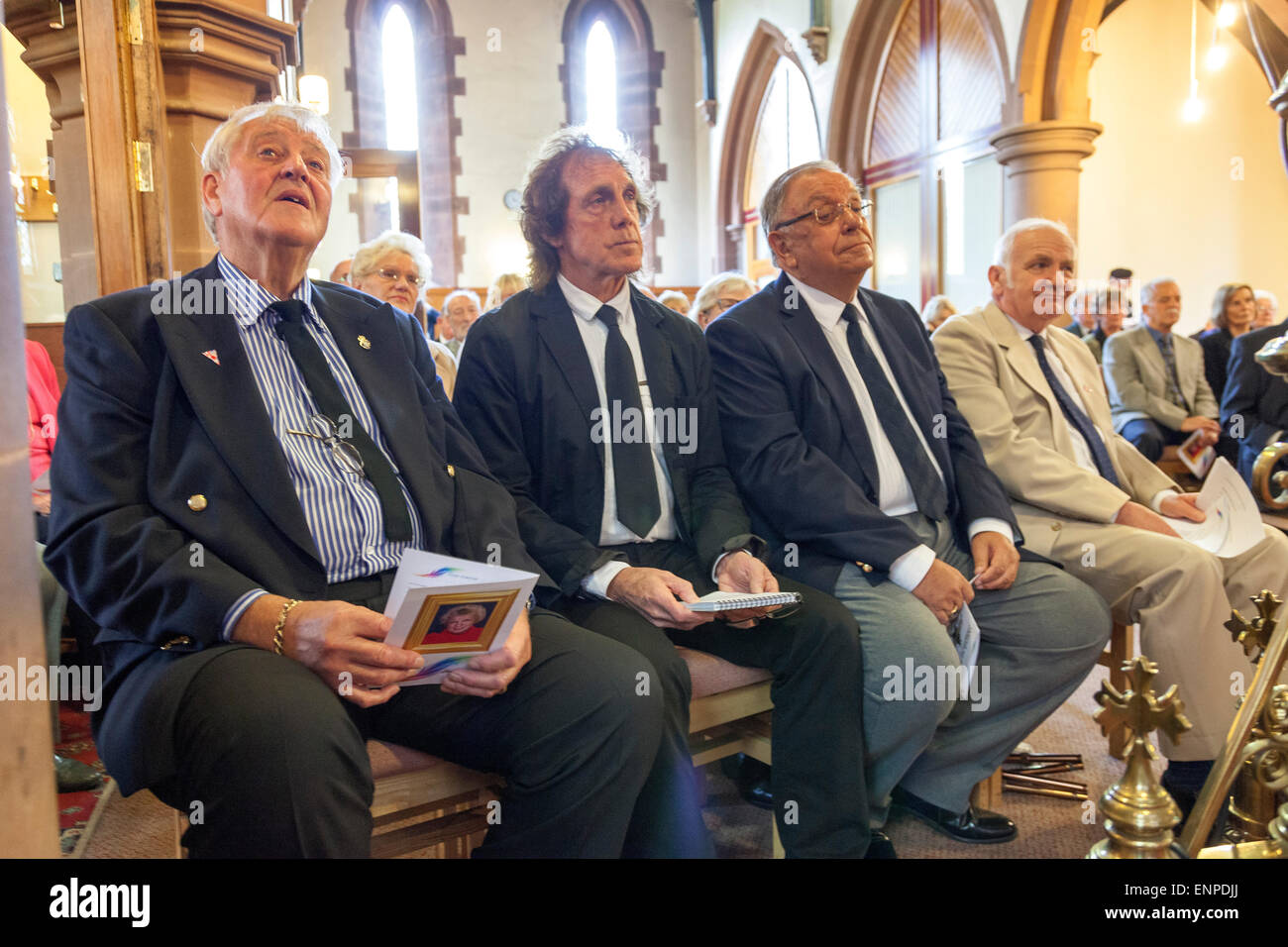 Holy Trinity Church, Chesterton, UK. 8 May 2015. Husband Colin Gregory, Stoke City, Everton and Aston Villa footballer Mike Pejic; Pete Conway, father of singer Robbie Williams and Douglas Brock at the Memorial Service for the life of Singer/Songwriter Jackie Trent. Credit:  John Henshall / Alamy Live News PER0551 Stock Photo