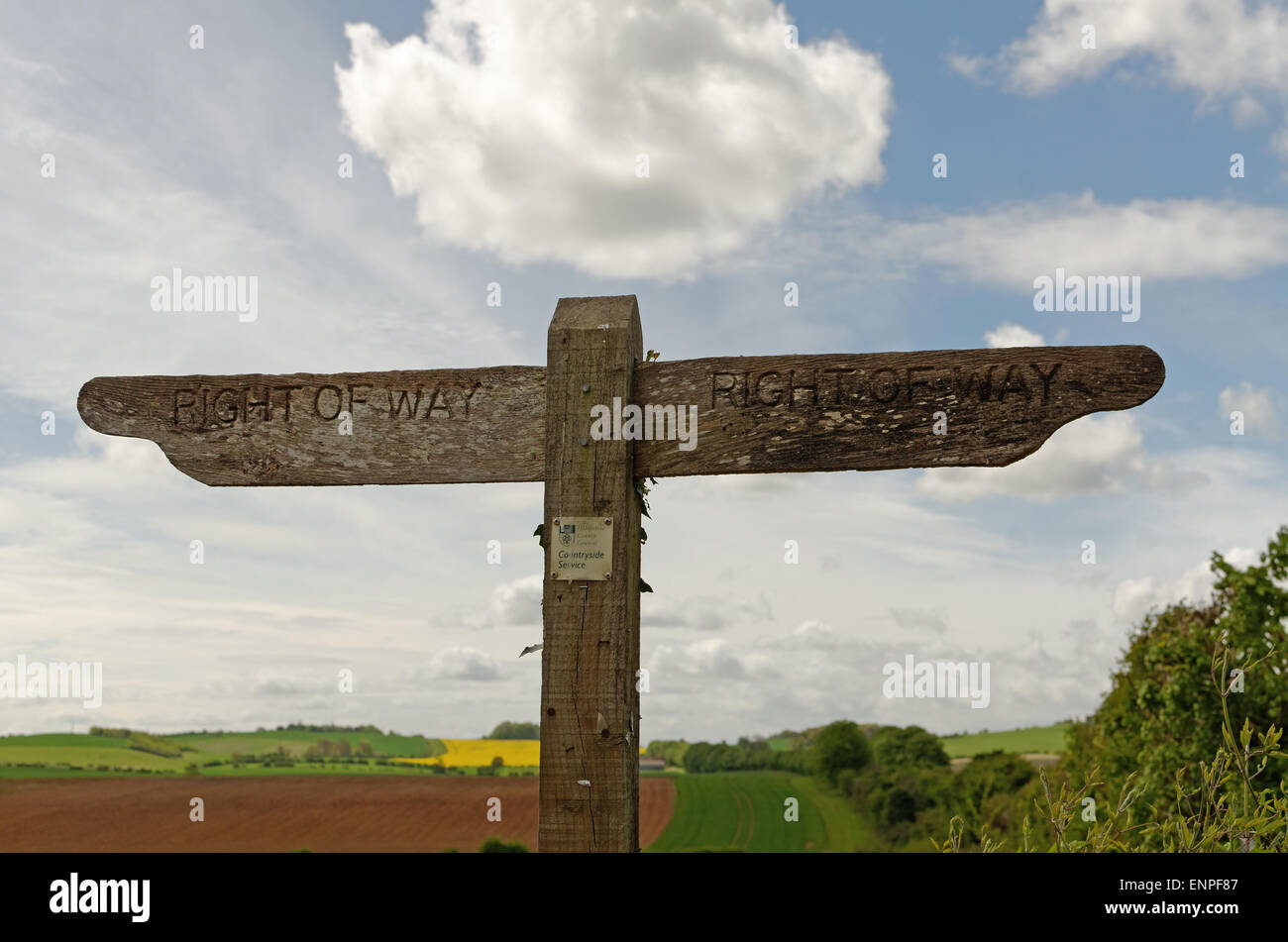 Wooden right-of-way signpost at Thruxton near Andover Hampshire England Stock Photo