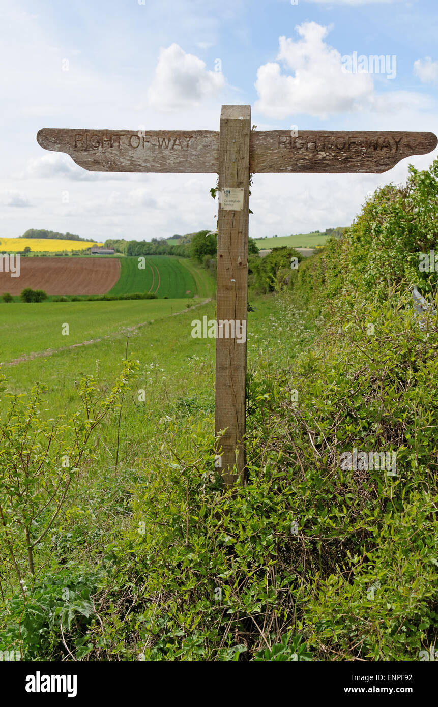 Wooden right-of-way signpost at Thruxton near Andover Hampshire England Stock Photo