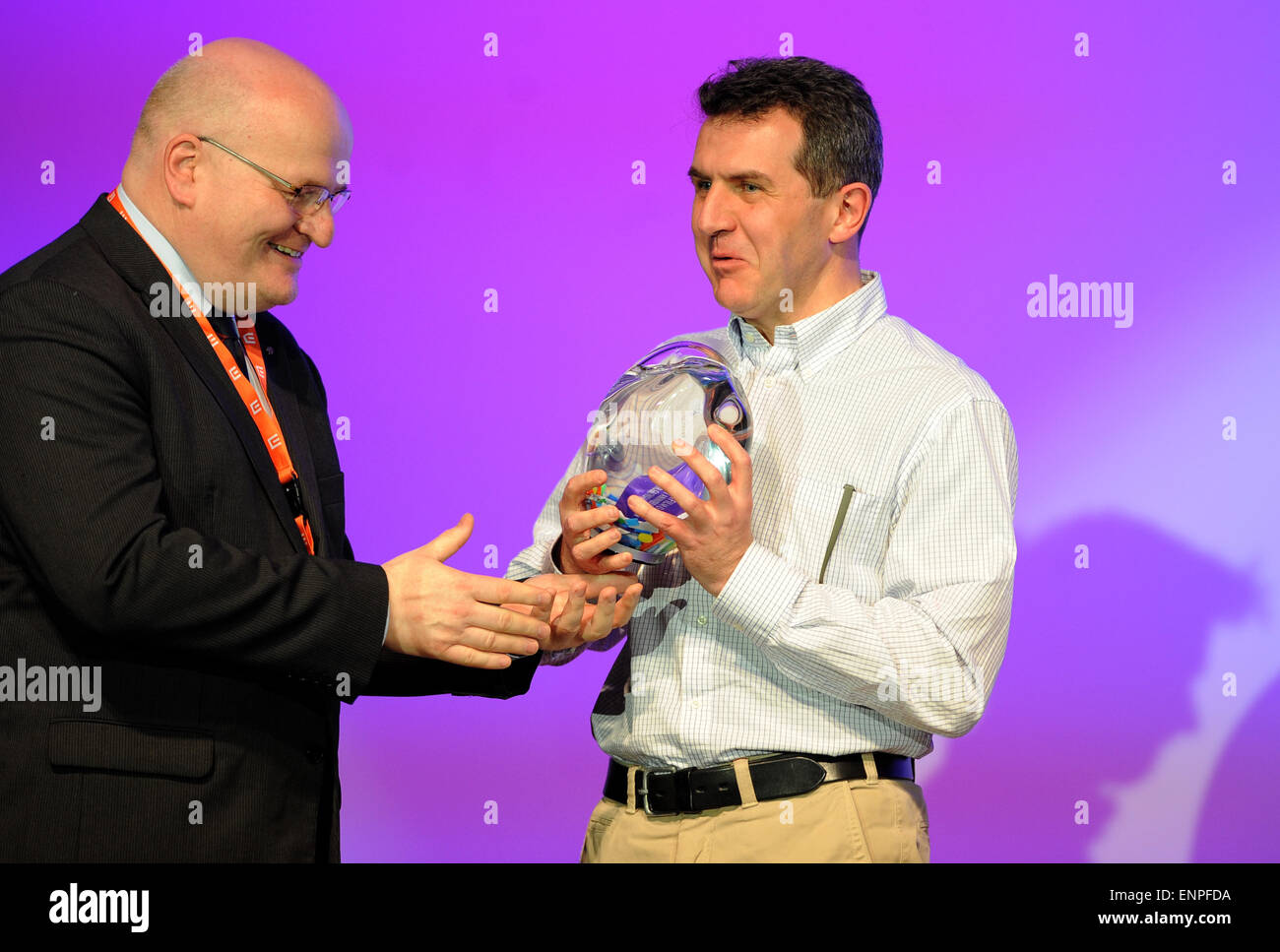 Trebon, Czech Republic. 9th May, 2015. Spanish director Sam Conflictivos (not pictured) won the main award for the best animated full-length film for adults with his puppet horror comedy Possessed at the Anifilm international festival of animated films in Trebon, Czech Republic, May 9, 2015. Representative of the Embassy of Spain Miguel Alonso Berrio (right) accepted the award on behalf of Sam Conflictivos from hands of Czech Minister of Culture Daniel Herman (left). © Vaclav Pancer/CTK Photo/Alamy Live News Stock Photo