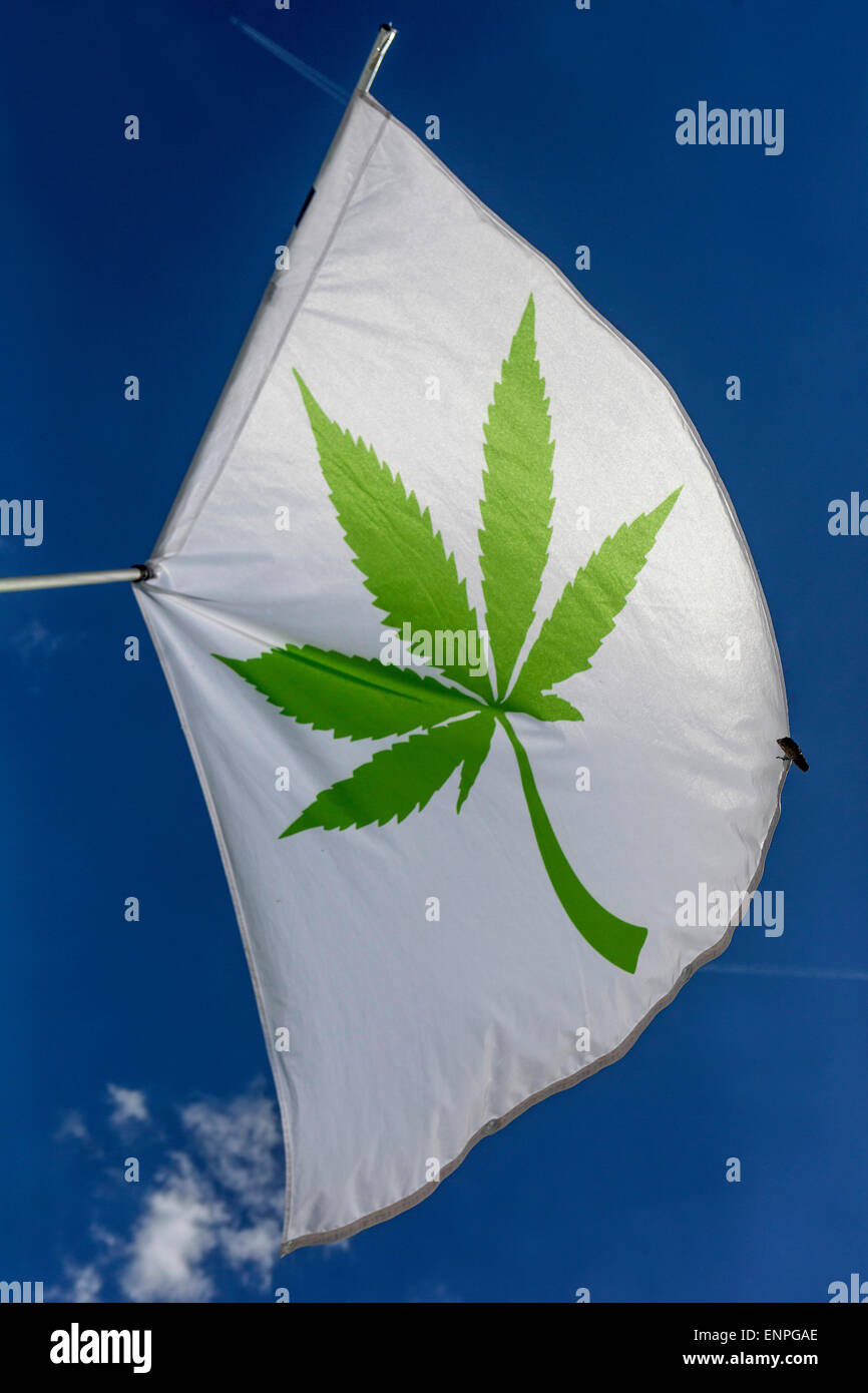 flag symbol, marijuana leaf, blue sky Stock Photo