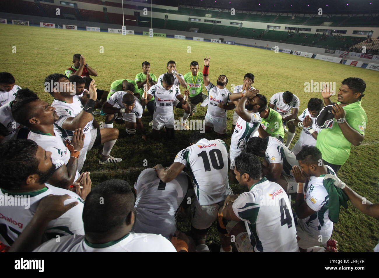 Bulacan, Philippines. 09th May, 2015. The Sri Lanka rugby team offer a prayer after defeating the Philippines, 27-14 in the finals of the Division 1, Asian Rugby Championship at the Philippine Sports Stadium. © Mark Cristino/Pacific Press/Alamy Live News Stock Photo