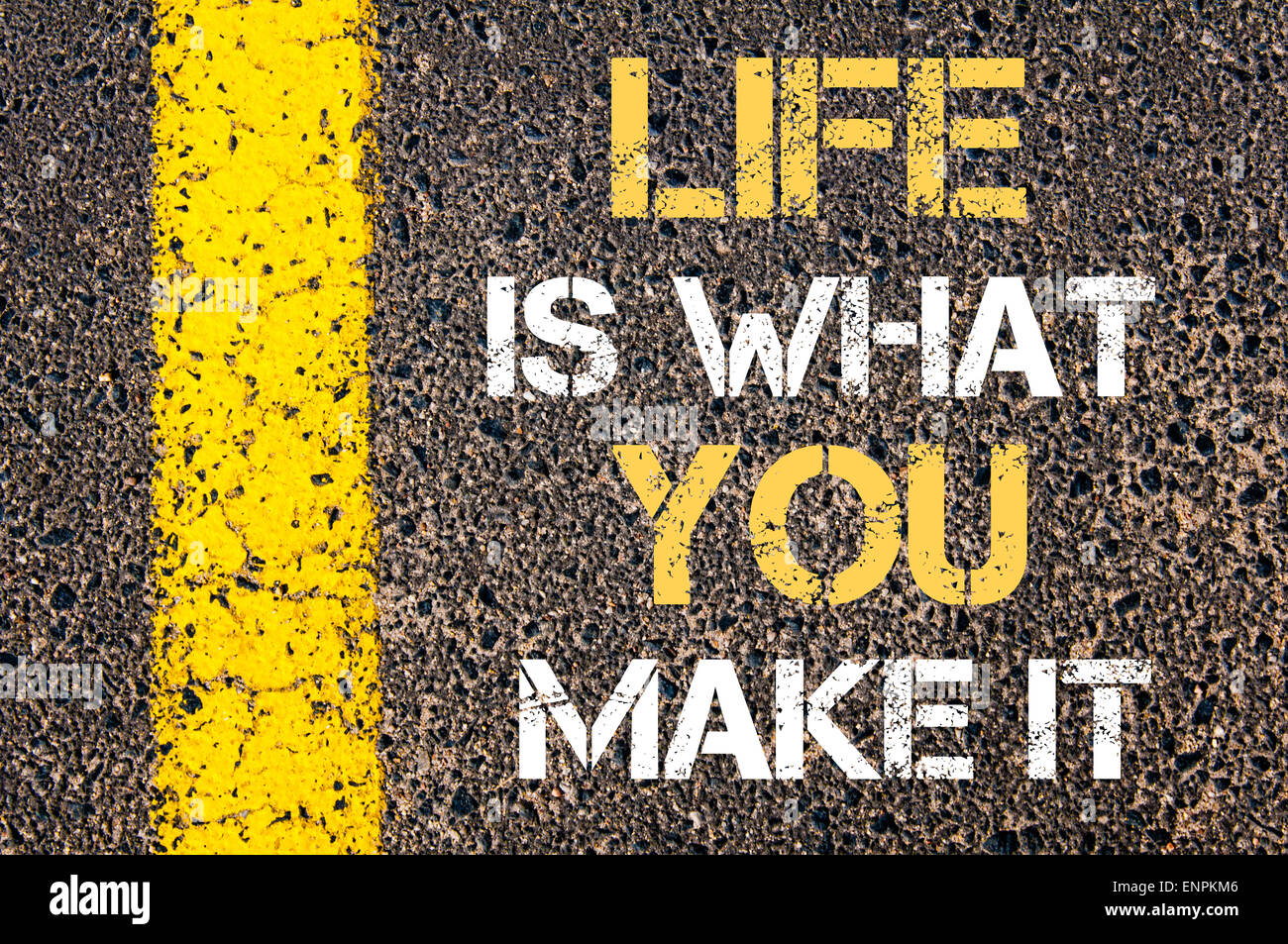 Life is what you make it motivational quote. Yellow paint line on the ...