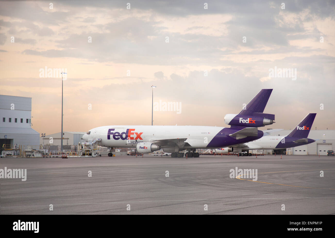 TORONTO - APRIL 30, 2015: FedEx Express is a subsidiary of FedEx Corporation, delivering packages and freight to more than 375 d Stock Photo