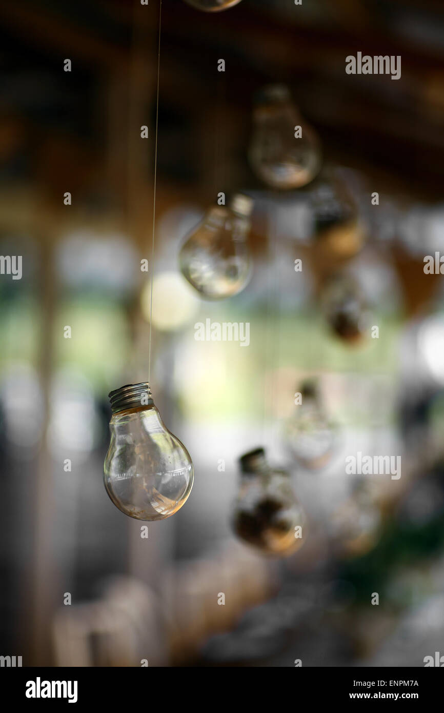 Color picture of a light bulb, suspended by a wire. Stock Photo