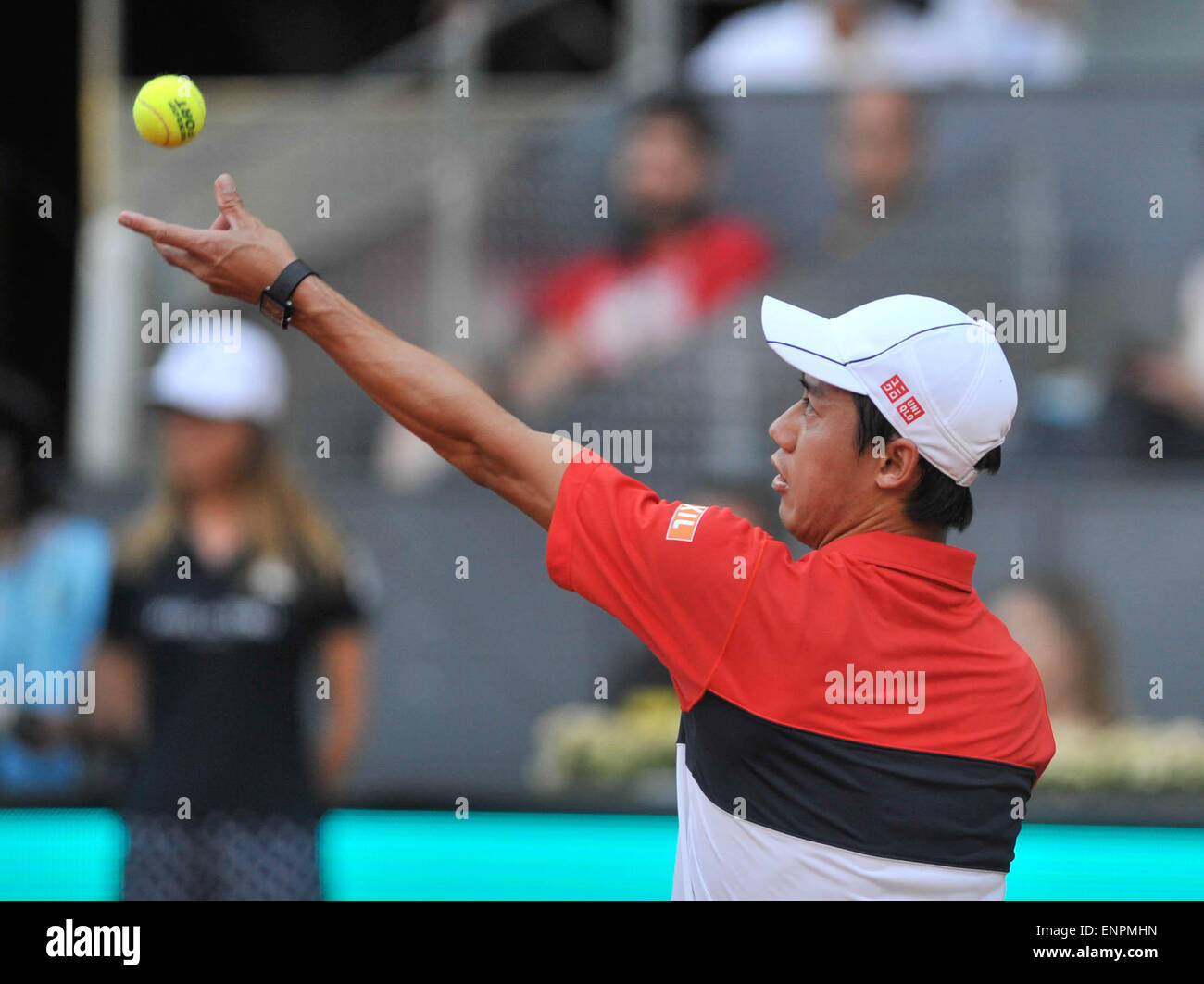 Madrid, Spain. 9th May, 2015. Kei Nishikori of Japan serves during a men's singles semifinal match against Andy Murray of Great Britain at the Madrid Open tennis tournament in Madrid, Spain, May 9, 2015. Kei Nishikori lost 0-2. Credit:  Xie Haining/Xinhua/Alamy Live News Stock Photo
