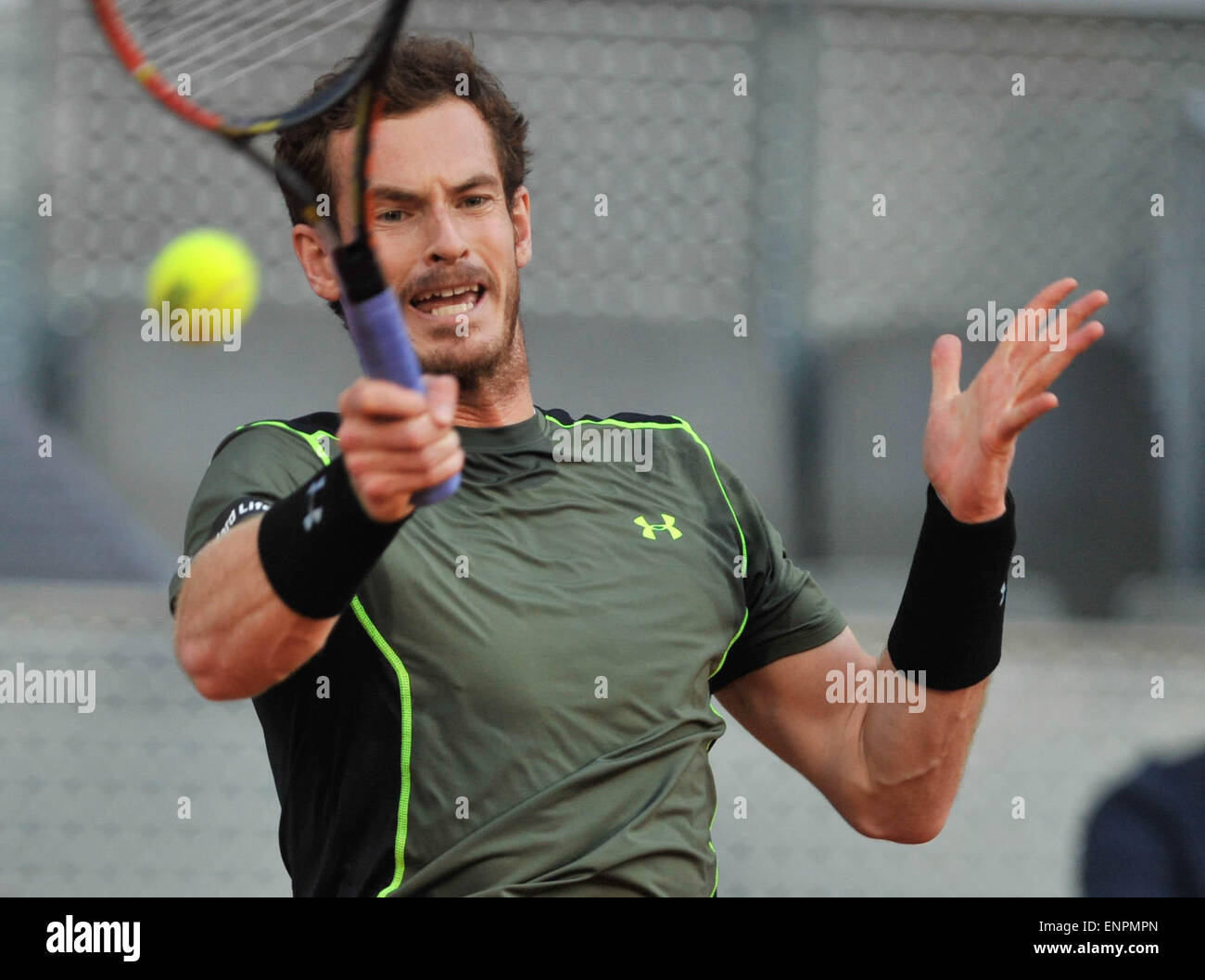 Madrid, Spain. 9th May, 2015. Andy Murray of Britain hits a return during a men's singles semifinal match against Kei Nishikori of Japan at the Madrid Open tennis tournament in Madrid, Spain, May 9, 2015. Andy Murray won 2-0. Credit:  Xie Haining/Xinhua/Alamy Live News Stock Photo