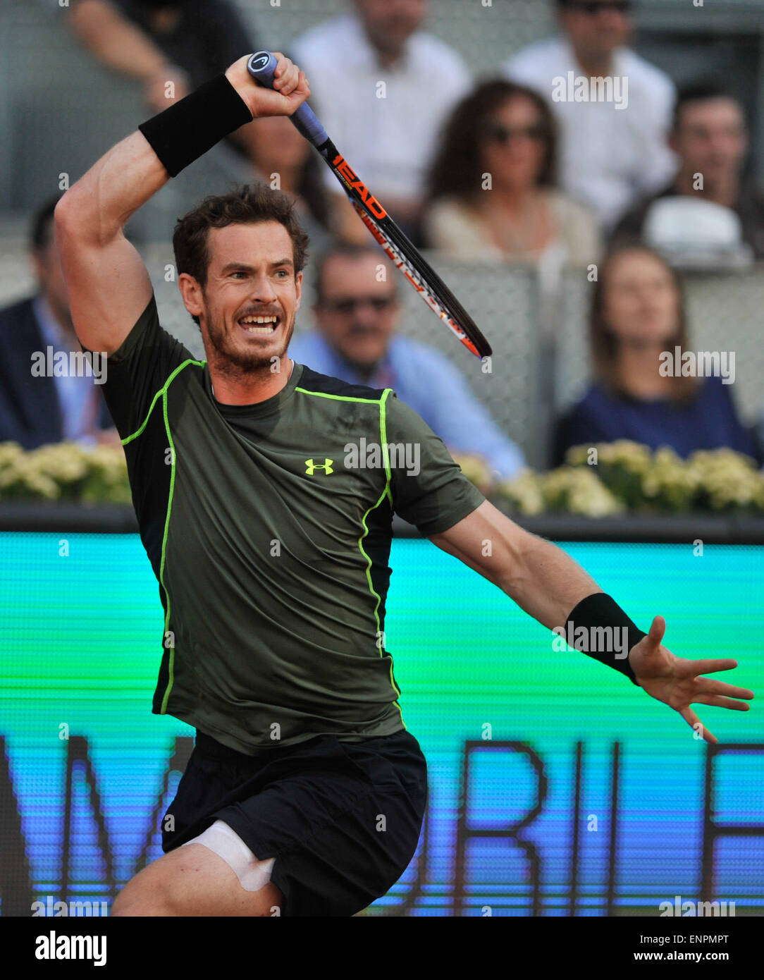 Madrid, Spain. 9th May, 2015. Andy Murray of Britain hits a return during a men's singles semifinal match against Kei Nishikori of Japan at the Madrid Open tennis tournament in Madrid, Spain, May 9, 2015. Andy Murray won 2-0. Credit:  Xie Haining/Xinhua/Alamy Live News Stock Photo