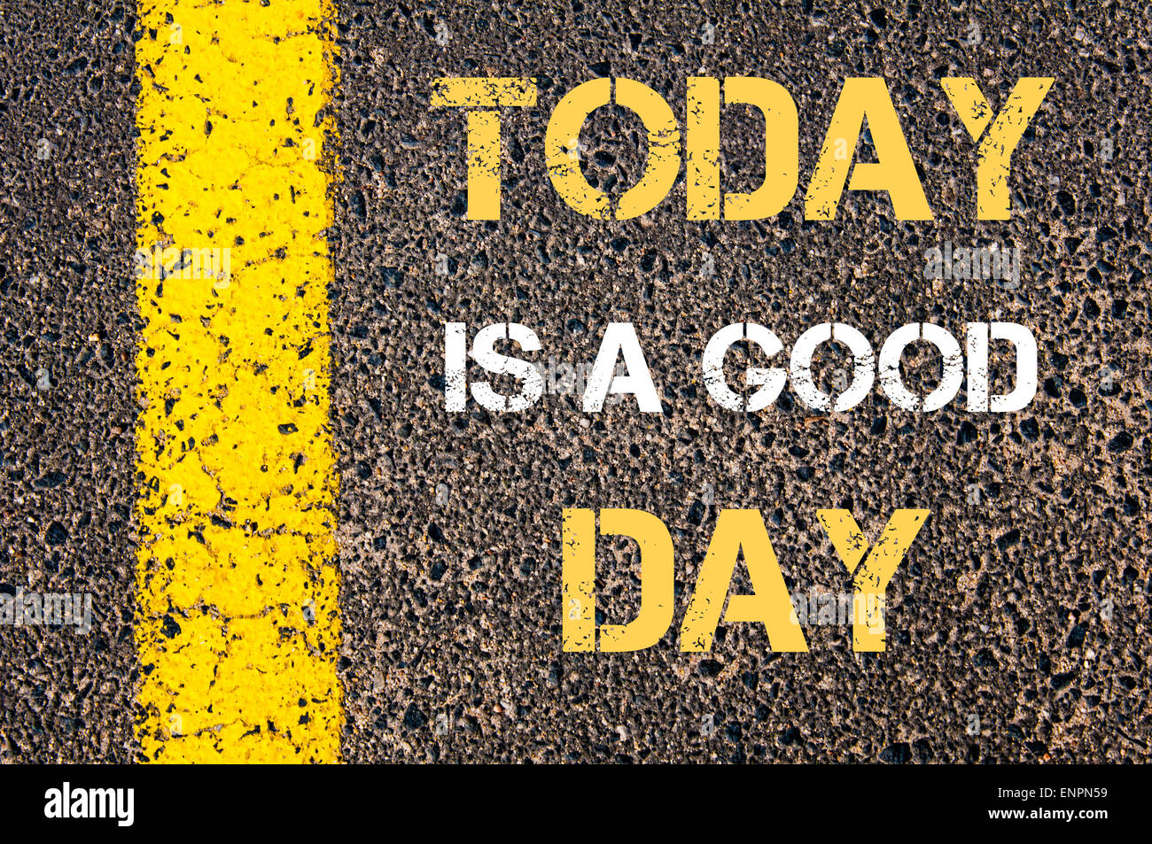 TODAY IS A GOOD DAY motivational quote. Yellow paint line on the road ...