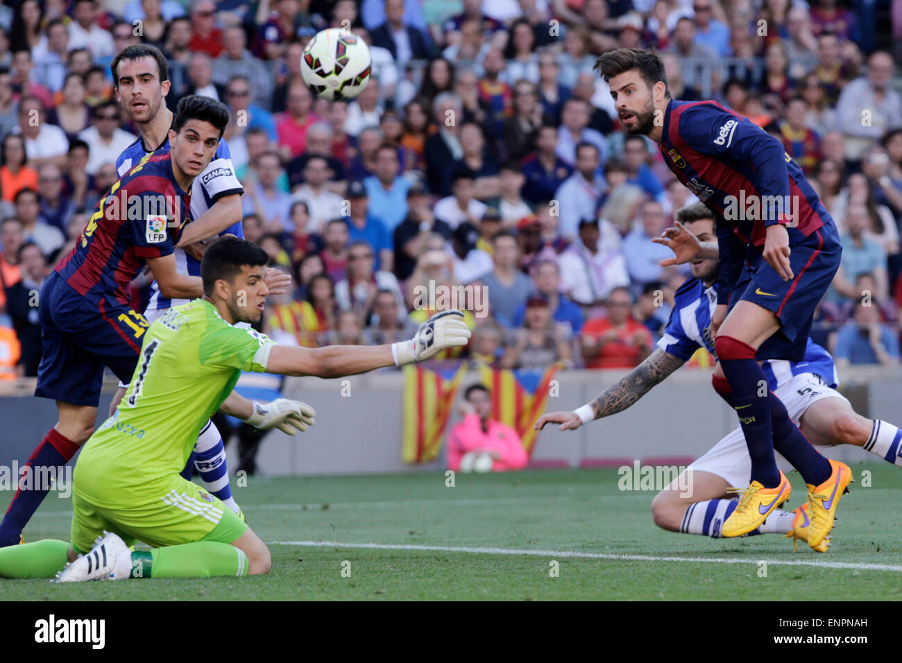 Barcelona, Spain. 9th May, 2015. FC Barcelona's Gerard Pique (front R) competes during the La Liga soccer match against Real Sociedad at Camp Nou Stadium in Barcelona, Spain, May 9, 2015. FC Barcelona won 2-0. Credit:  Pau Barrena/Xinhua/Alamy Live News Stock Photo