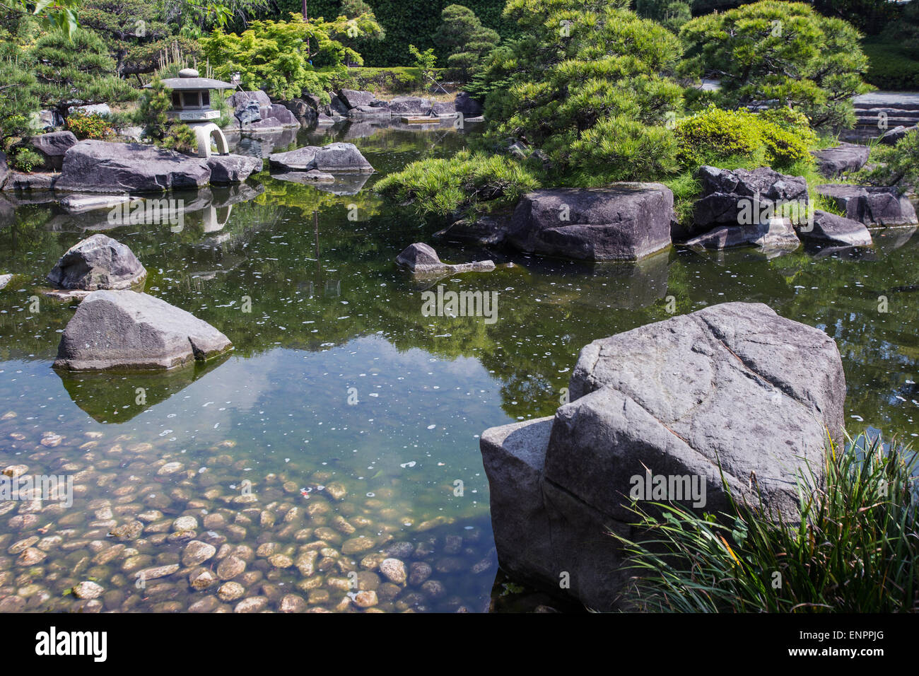 Shiosai Garden was once a part of the Hayama Imperial Villa.  It is a traditional Japanese pond garden with teahouses Stock Photo