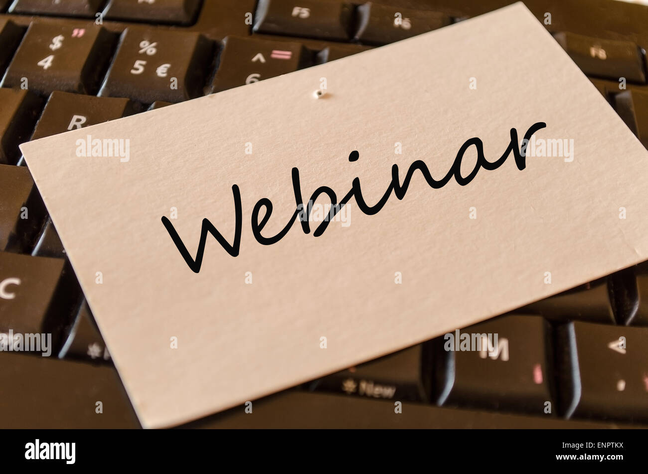 Webinar Concept on black keyboard Stock Photo