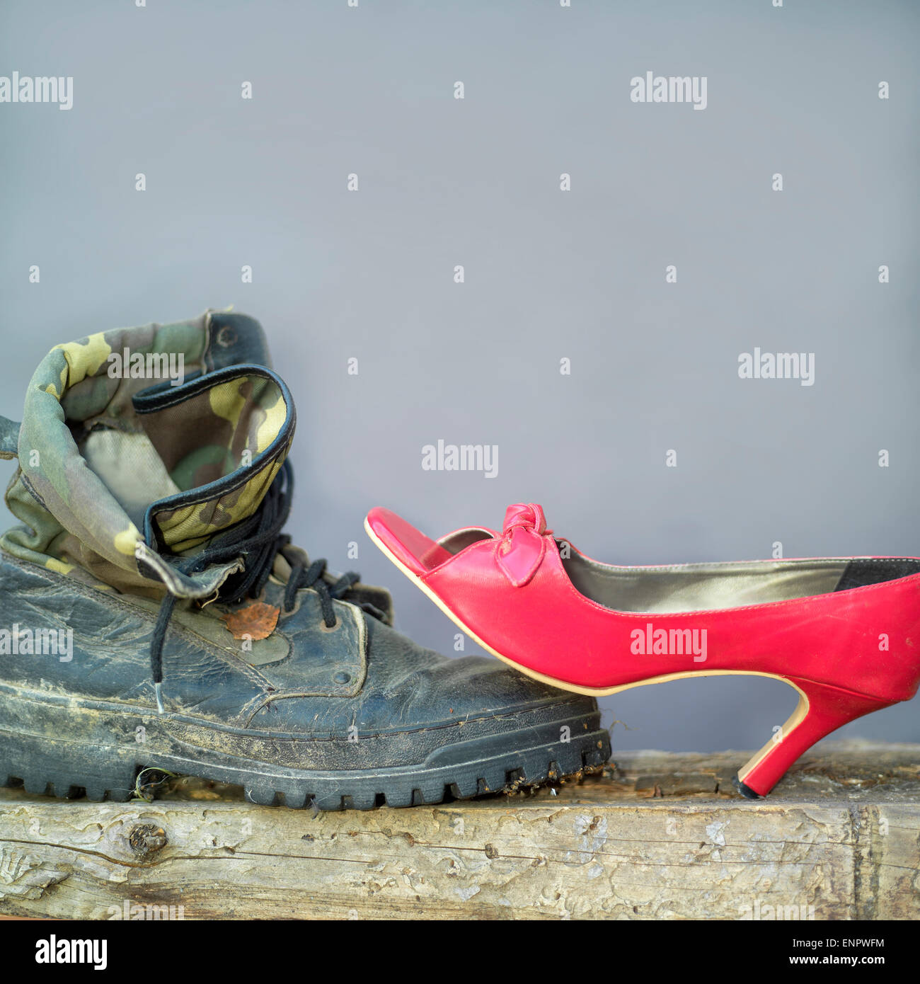 High Heel And Military Boots Stock Photo - Alamy