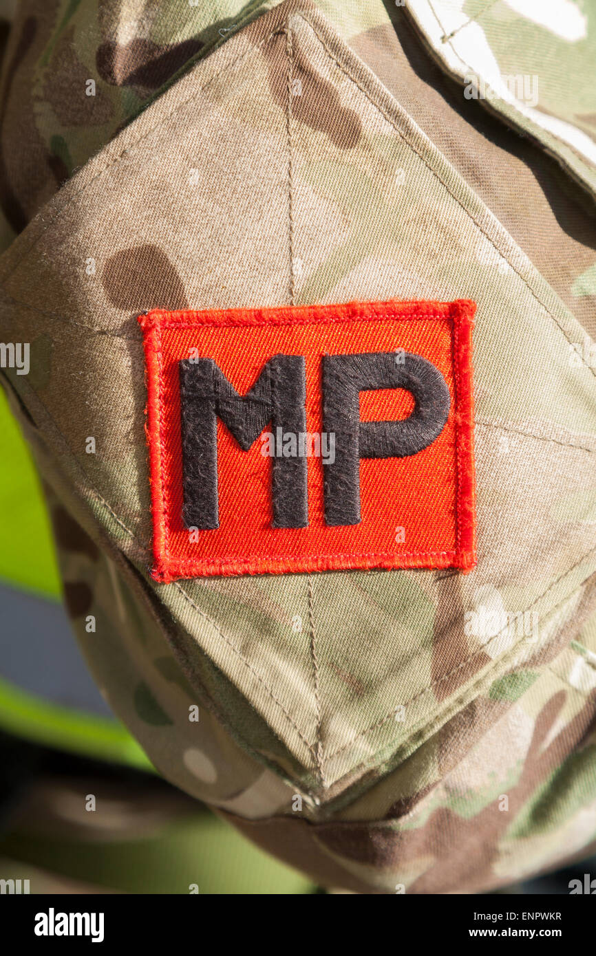 British army soldier of the Royal Military Police; a Red Cap / Redcap Military MP policeman insignia / badge / crest. UK. Stock Photo