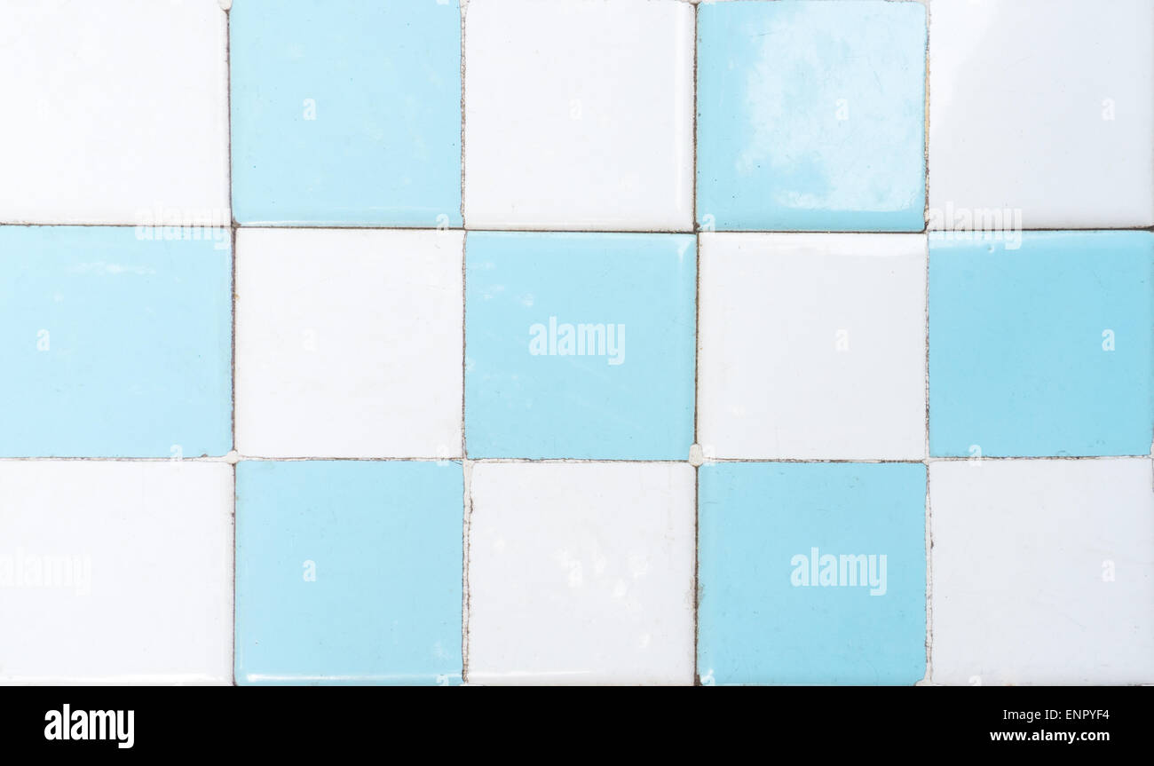 White and Blue Restroom Tile Wall with Chess Pattern Stock Photo