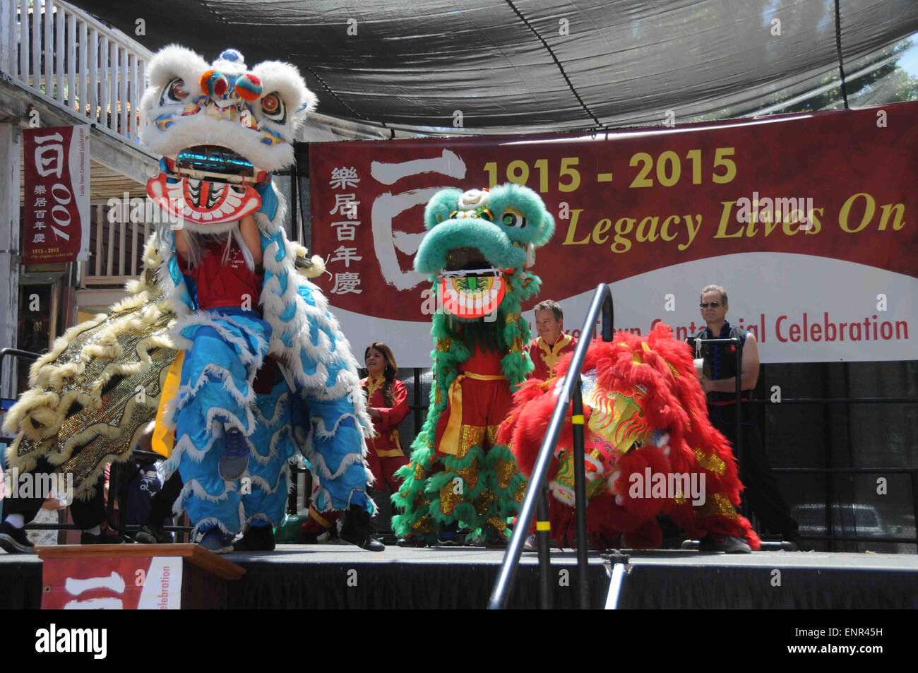 Locke, USA. May 10th, 2015. People perform lion dance to celebrate the 100th birthday of Locke Town, the largest and most intact surviving example of an historic rural Chinese-American community, in Locke, North California, the United States, on May 9, 2015. Considered as the last rural Chinatown in the United States, Locke put on its centennial celebrations named The Legacy Lives On on Sunday. Founded in 1915, Locke, about 120 km northeast to San Francisco, is the only town in the country built by the Chinese for the Chinese. Locke was designated a National Historic Landmark D Stock Photo