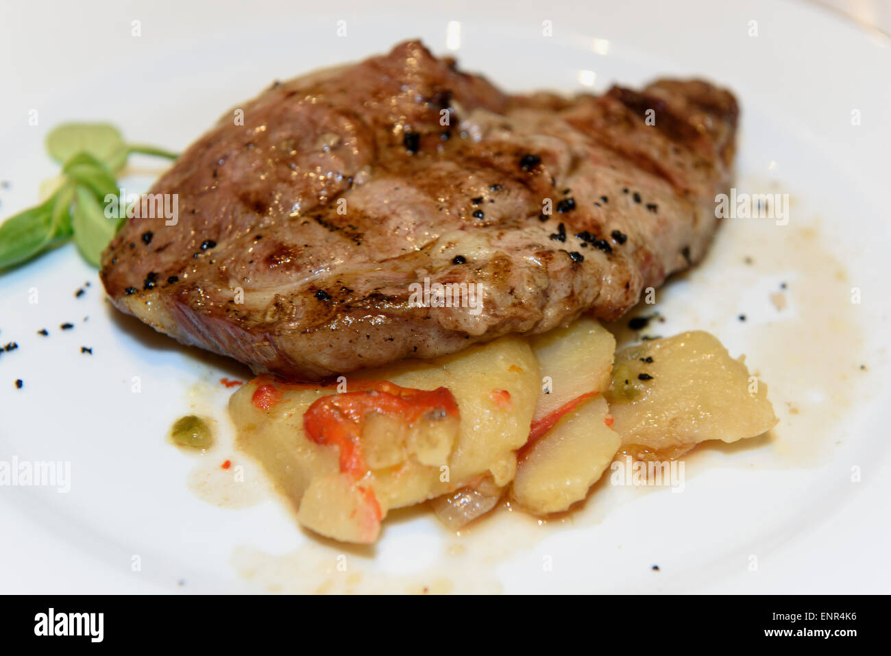 Aguja de chato murciano-meat dish of local pig in  Parador -'CASTILLO de LORCA', Spain Stock Photo