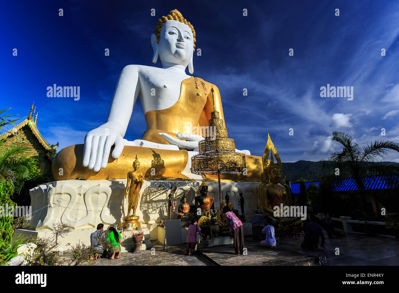 Sitting Buddha Statue with prayers in Wat Phra That Doi Kham Temple ...