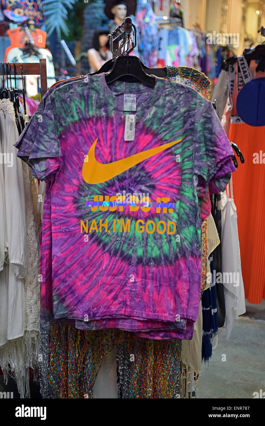 A tee shirt spoofing Nike on display at the Patricia Field store on Bowery in Greenwich Village, New York City Stock Photo