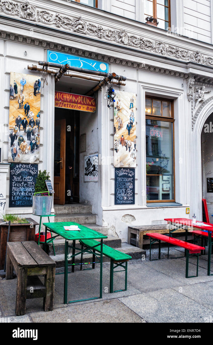 Buchhandlung caffetteria and bar exterior in old building with outside tables and benches,  Tucholskystrasse, Berlin Stock Photo