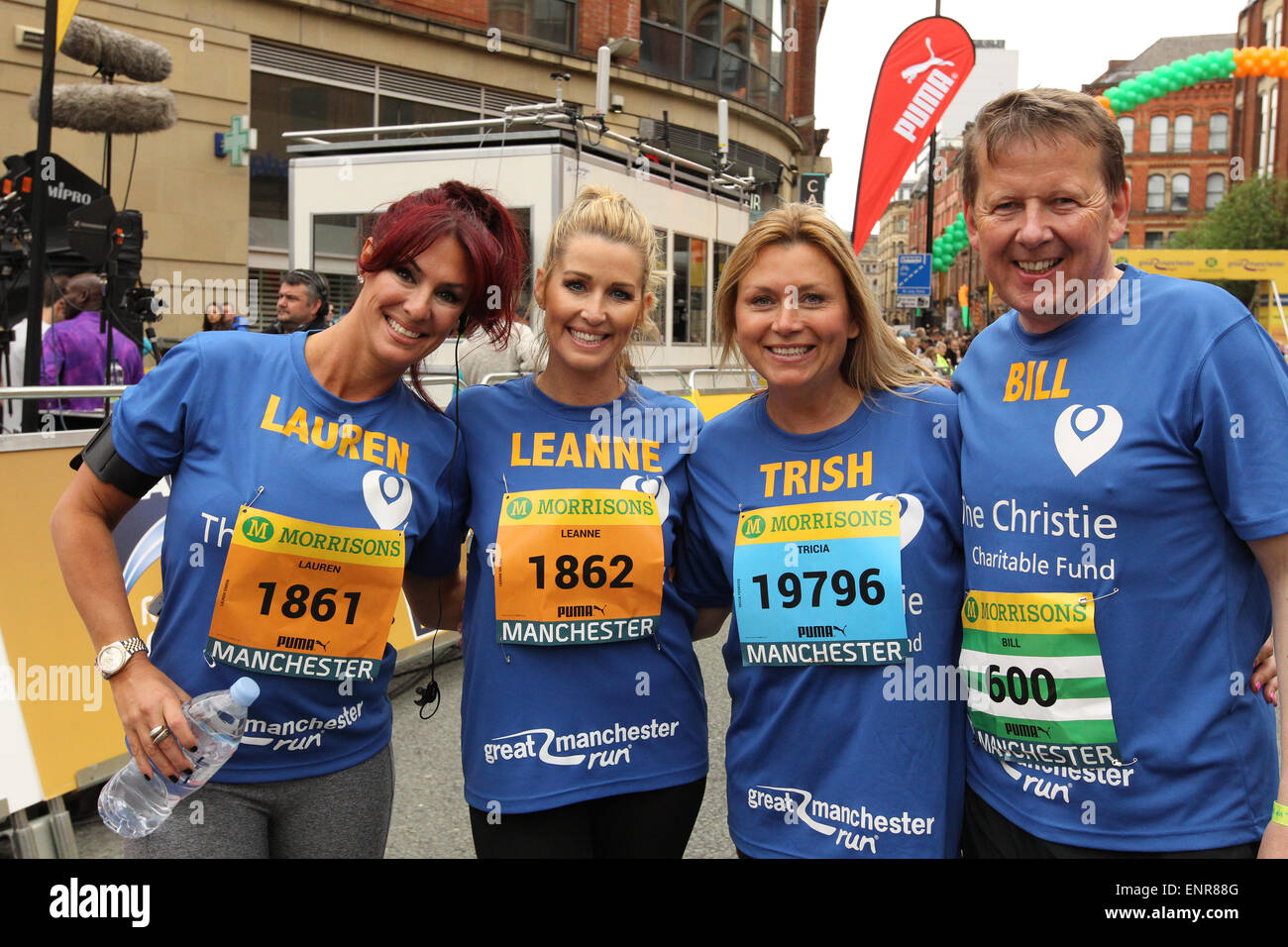 Manchester, UK. Sunday 10 May 2015. The city hosted the Morrison's Great Manchester Run in the heart of the city centre. Celebrity members of The Christie Team: reality TV stars Lauren Simon & Leanne Browne, actress Tricia Penrose & BBC presenter Bill Turnbull. Credit:  Michael Buddle/Alamy Live News Stock Photo
