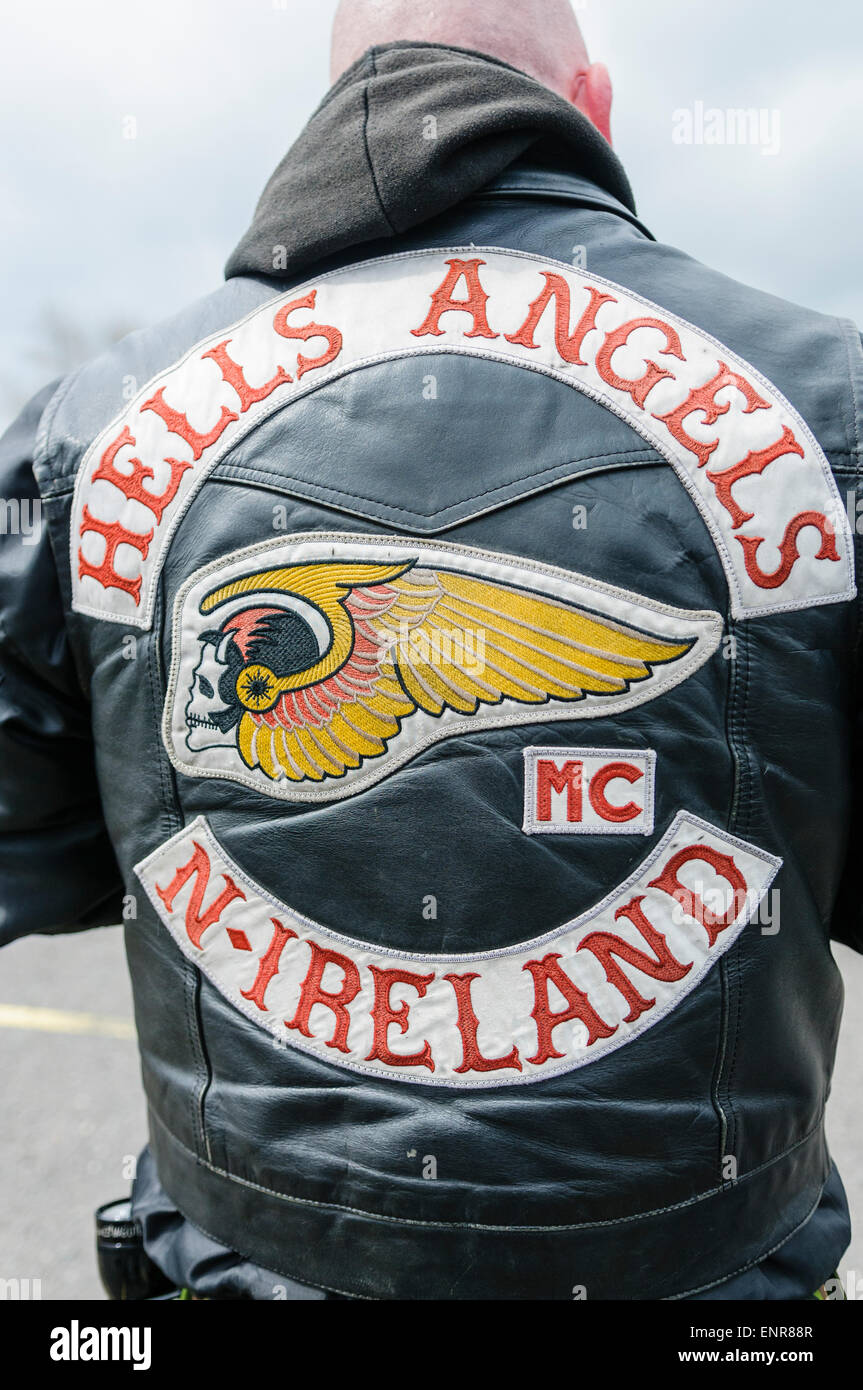 Man wears a Hells Angels Northern Ireland motorcycle club leather jacket Stock Photo